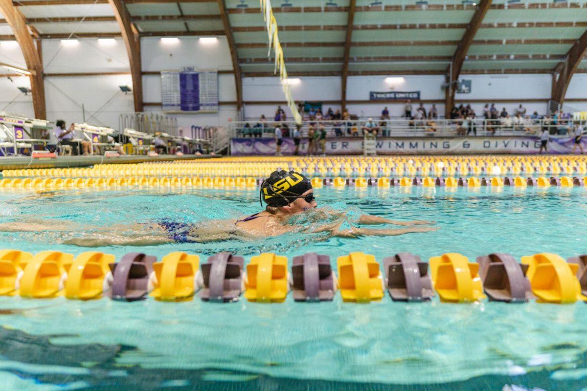 An LSU swimmer takes a lap during the break on Friday, Sept. 23, 2022, during LSU&#8217;s victory over Tulane and Vanderbilt at the LSU Natatorium on Nicholson Drive in Baton Rouge, La.