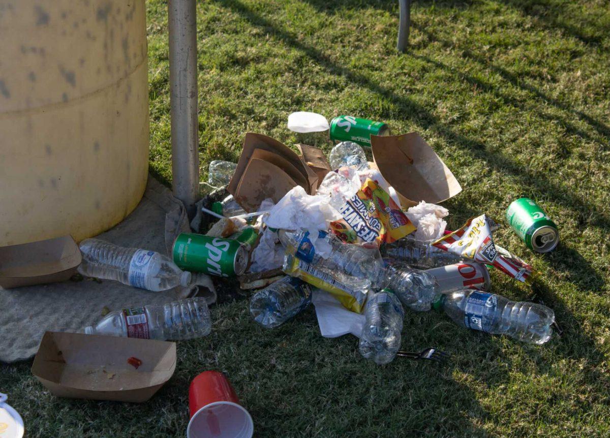 Garbage on the LSU Parade Ground after tailgating on Saturday, Sept. 24, 2022, in Baton Rouge, La.