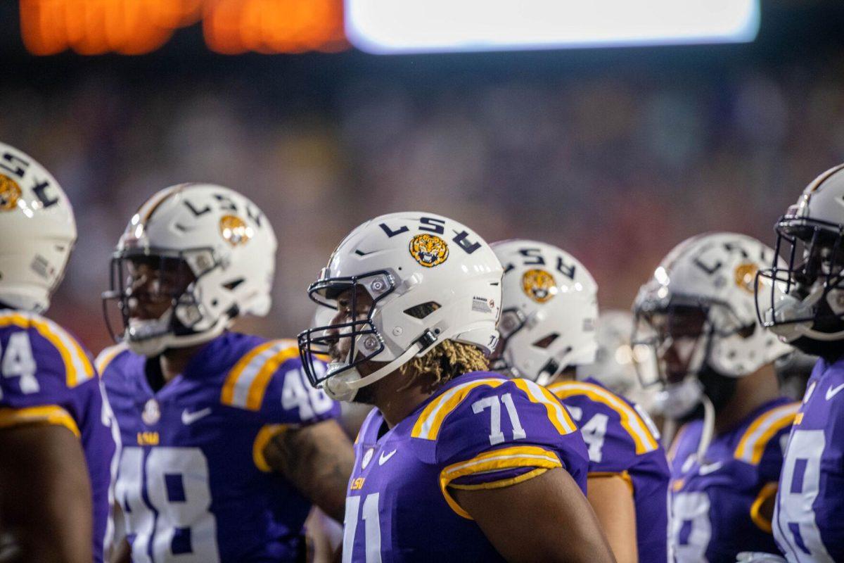 LSU football players stand together awaiting their next play on Saturday, Sept. 24, 2022, during the LSU vs New Mexico game in Tiger Stadium.