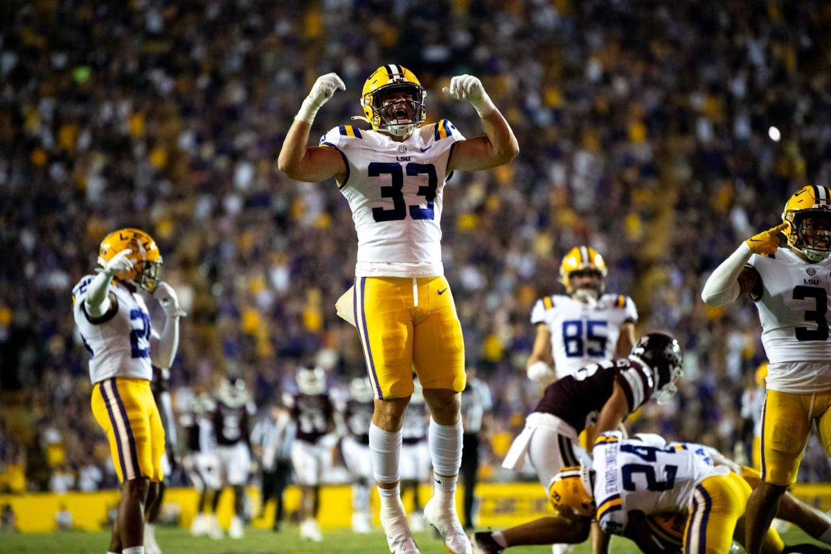 LSU football sophomore linebacker West Weeks (33) celebrates the Mississippi State muffed kick Saturday, Sept. 17, 2022 during LSU&#8217;s 31-16 win against Mississippi State at Tiger Stadium in Baton Rouge, La.