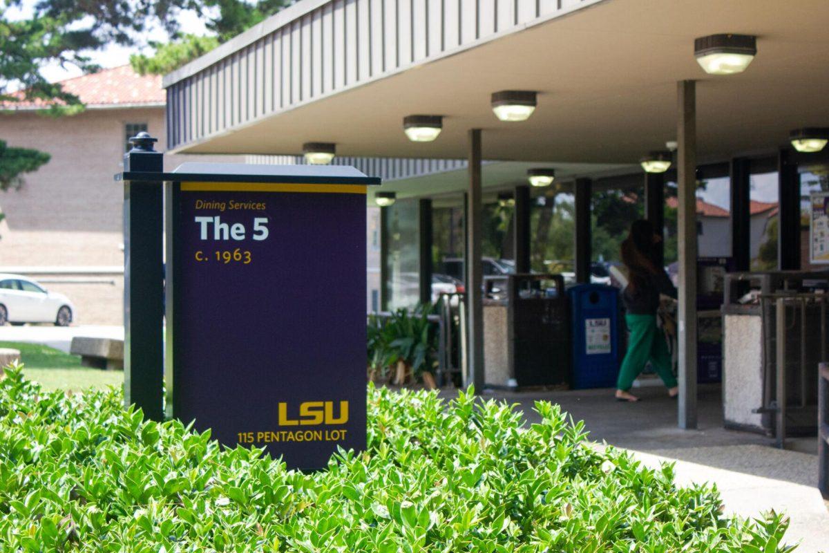 A student walks on Sunday, Sept. 11, 2022, into The 5 Dining Hall in Baton Rouge, La.