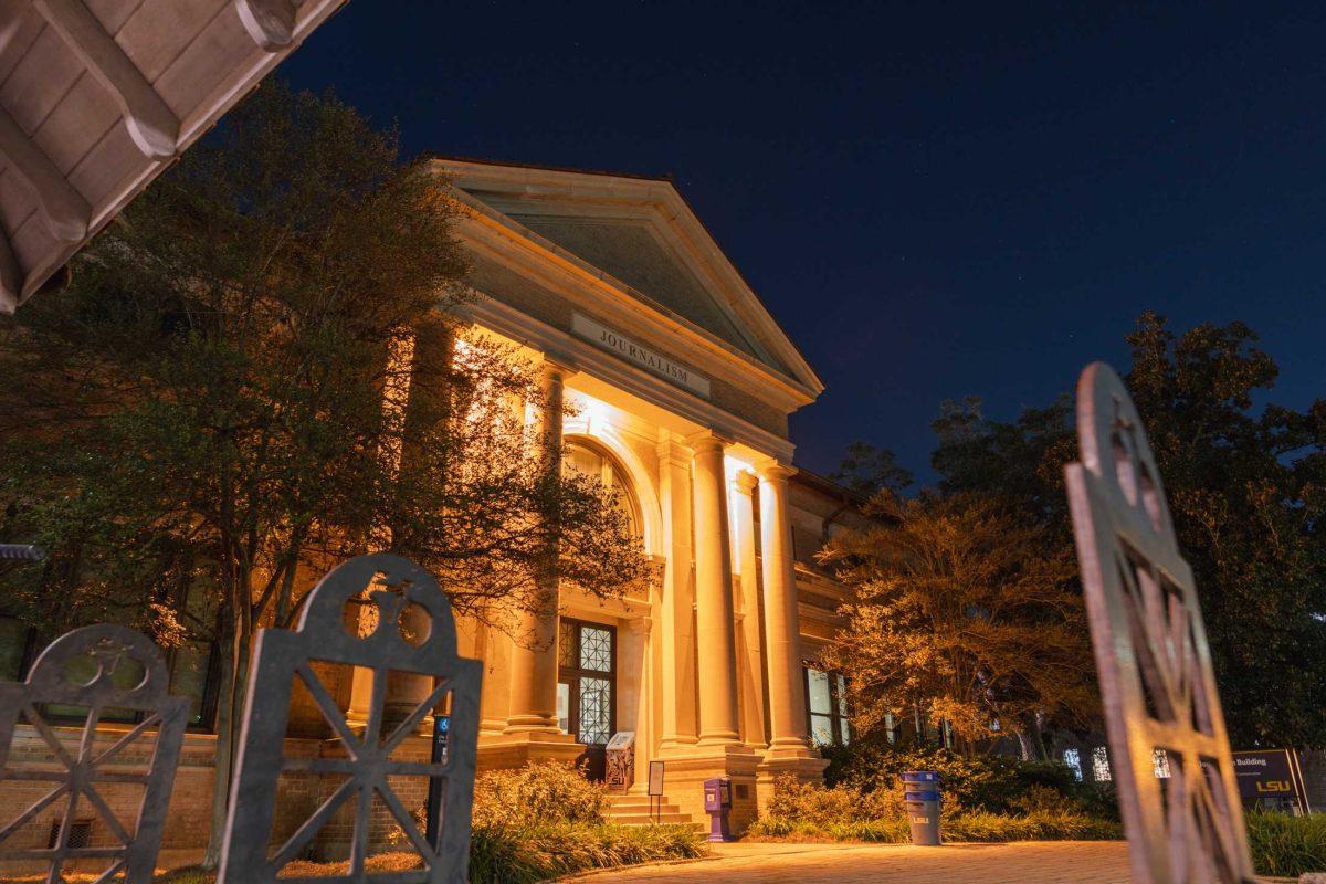 Lights illuminate the Journalism Building&#8217;s main entrance on Tuesday, Sept. 13, 2022, on Field House Drive in Baton Rouge, La.