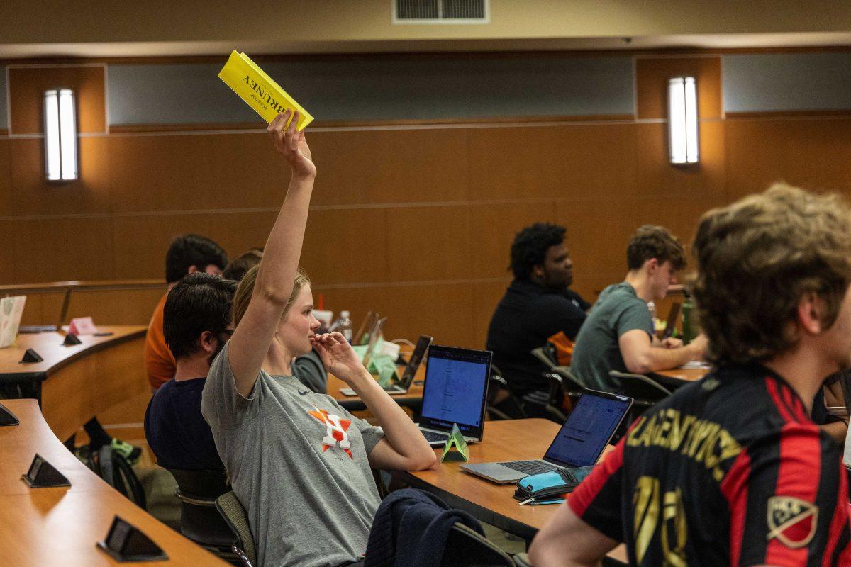 LSU Student Government business senator Emma Bruney raises her hand to ask a question Wednesday, Sept. 21, 2022, during a meeting at the Capital Chamber in the LSU Student Union.