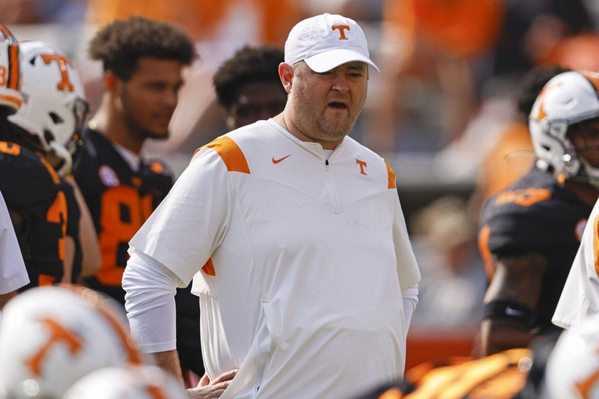 FILE - Tennessee head coach Josh Heupel watches his players warmup before an NCAA college football game against South Carolina Saturday, Oct. 9, 2021, in Knoxville, Tenn. No. 17 Pittsburgh hosts No. 24 Tennessee on Saturday. (AP Photo/Wade Payne, File)