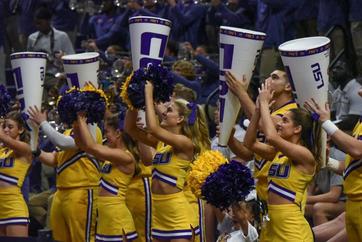 LSU cheerleaders cheer on volleyball players on Wednesday, Sept. 21, 2022, during LSU&#8217;s 3-2 win over Arkansas at the Pete Maravich Assembly Center in Baton Rouge, La.
