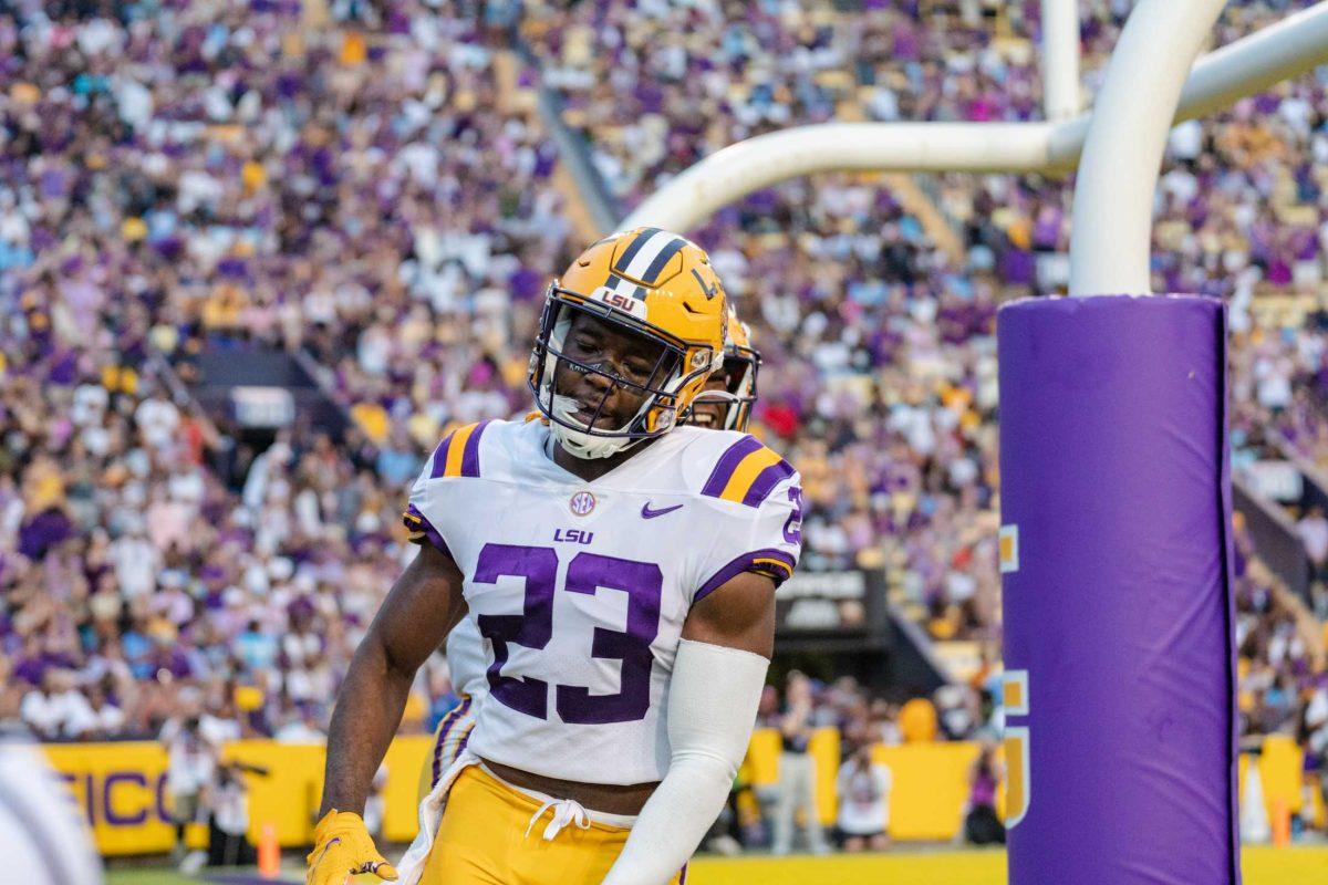 LSU football fifth-year senior linebacker Micah Baskerville (23) scores after an interception on Saturday, Sept. 10, 2022, during LSU&#8217;s 65-17 win over Southern at Tiger Stadium in Baton Rouge, La.