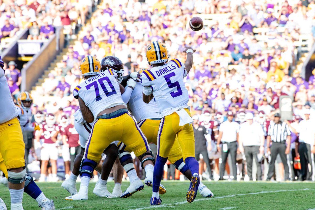 LSU football junior quarterback Jayden Daniels (5) throws the ball Saturday, Sept. 17, 2022 during LSU’s 31-16 win against Mississippi State at Tiger Stadium in Baton Rouge, La.