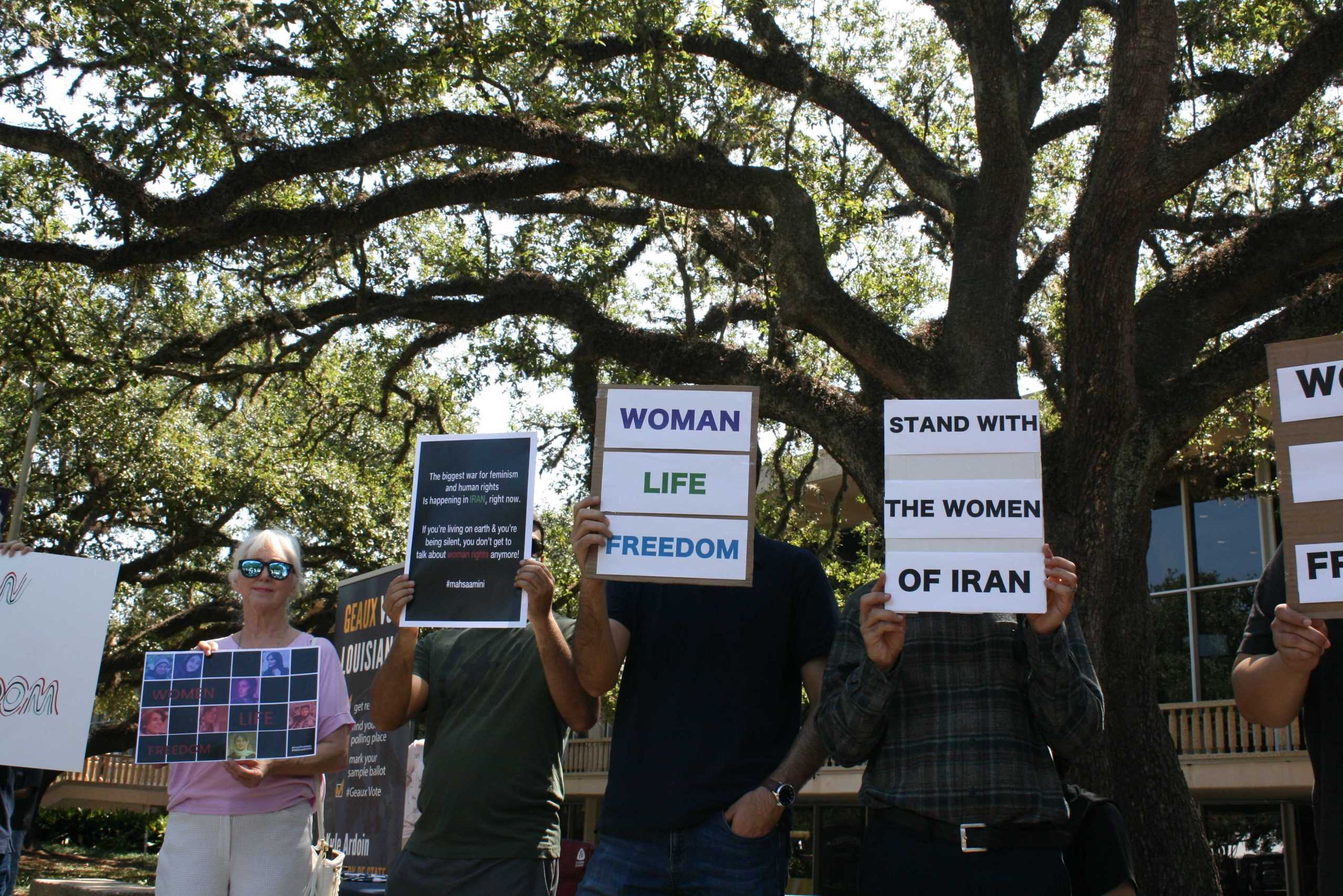 'Stand with the women of Iran:' LSU students, Iranians protest nation's human rights violations