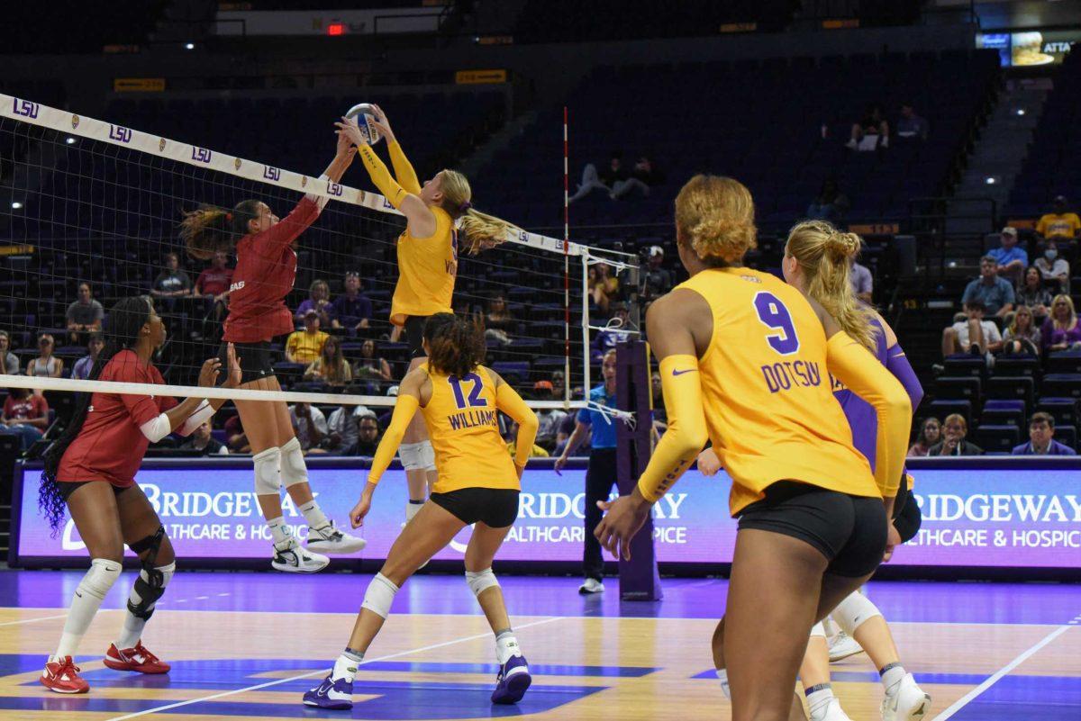 LSU graduate Josie Vondran blocks the ball on Wednesday, Sept. 21, 2022, during LSU&#8217;s 3-2 win over Arkansas at the Pete Maravich Assembly Center in Baton Rouge, La.