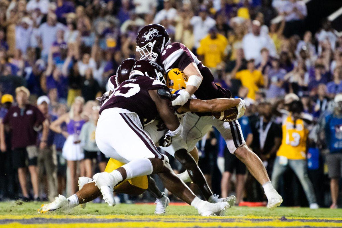LSU football junior running back Josh Williams (27) reaches across the goal line for a touchdown Saturday, Sept. 17, 2022 during LSU’s 31-16 win against Mississippi State at Tiger Stadium in Baton Rouge, La.