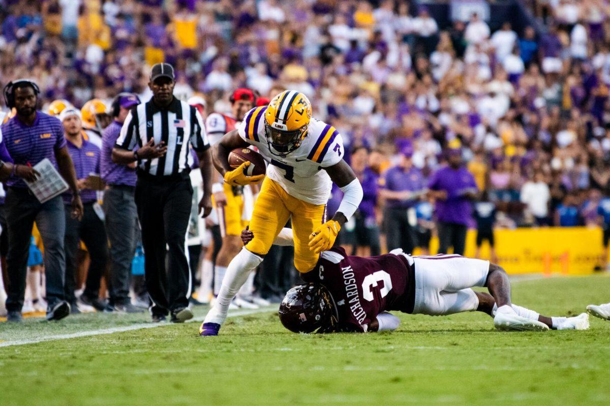 LSU football junior wide receiver Kayshon Boutte (7) tries to get away from Mississippi State junior cornerback Decamerion Richardson (3) Saturday, Sept. 17, 2022 during LSU’s 31-16 win against Mississippi State at Tiger Stadium in Baton Rouge, La.