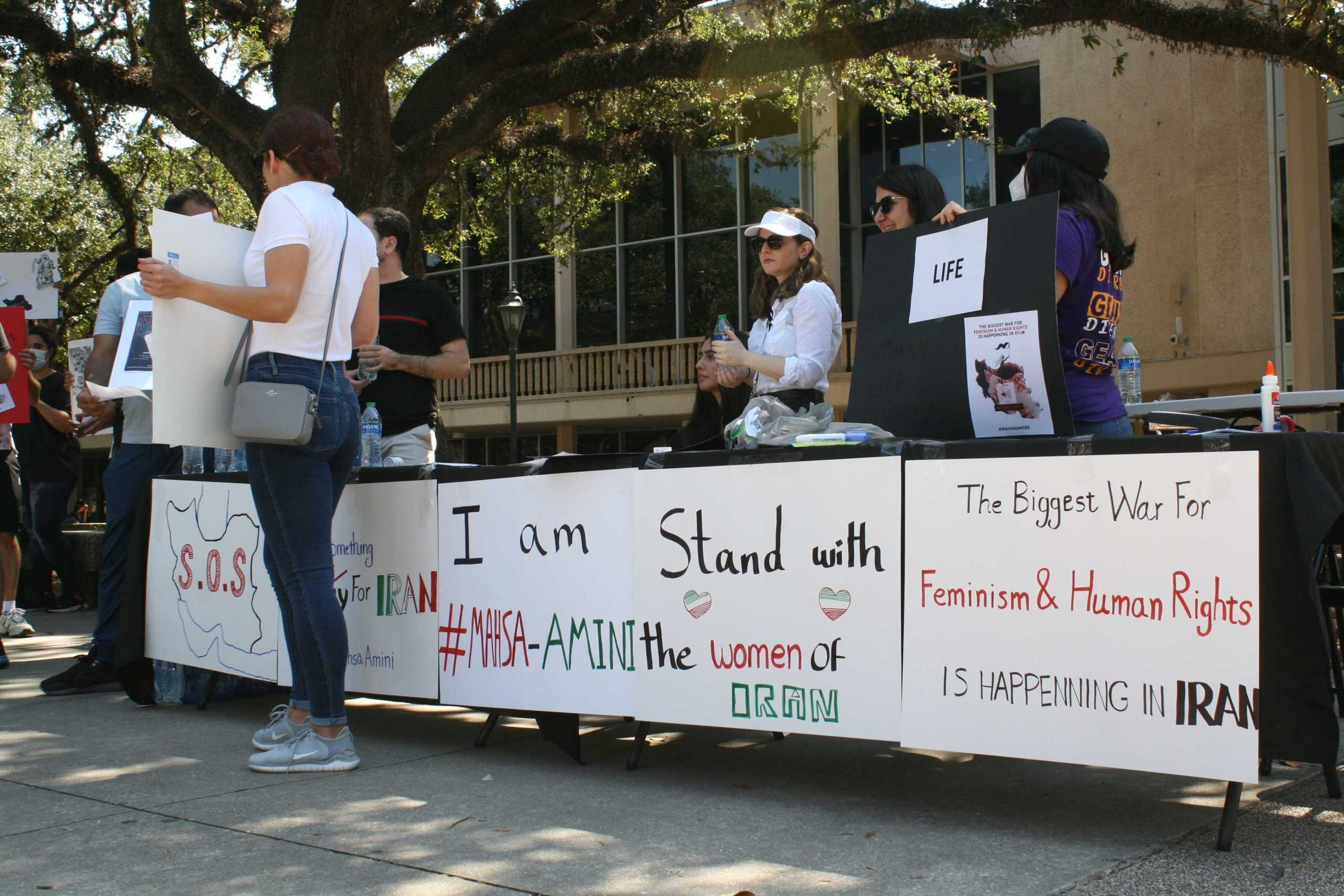 'Stand with the women of Iran:' LSU students, Iranians protest nation's human rights violations