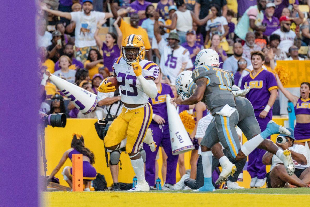 LSU football fifth-year senior linebacker Micah Baskerville (23) scores after an interception on Saturday, Sept. 10, 2022, during LSU&#8217;s 65-17 win over Southern at Tiger Stadium in Baton Rouge, La.