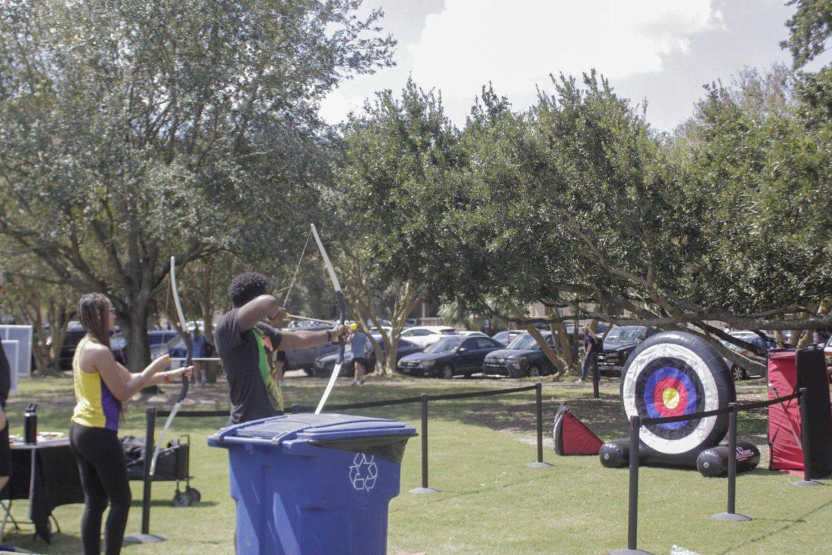 Students practice archery during Fall Fest on Friday, Sept. 16, 2022, on the LSU Parade Ground.