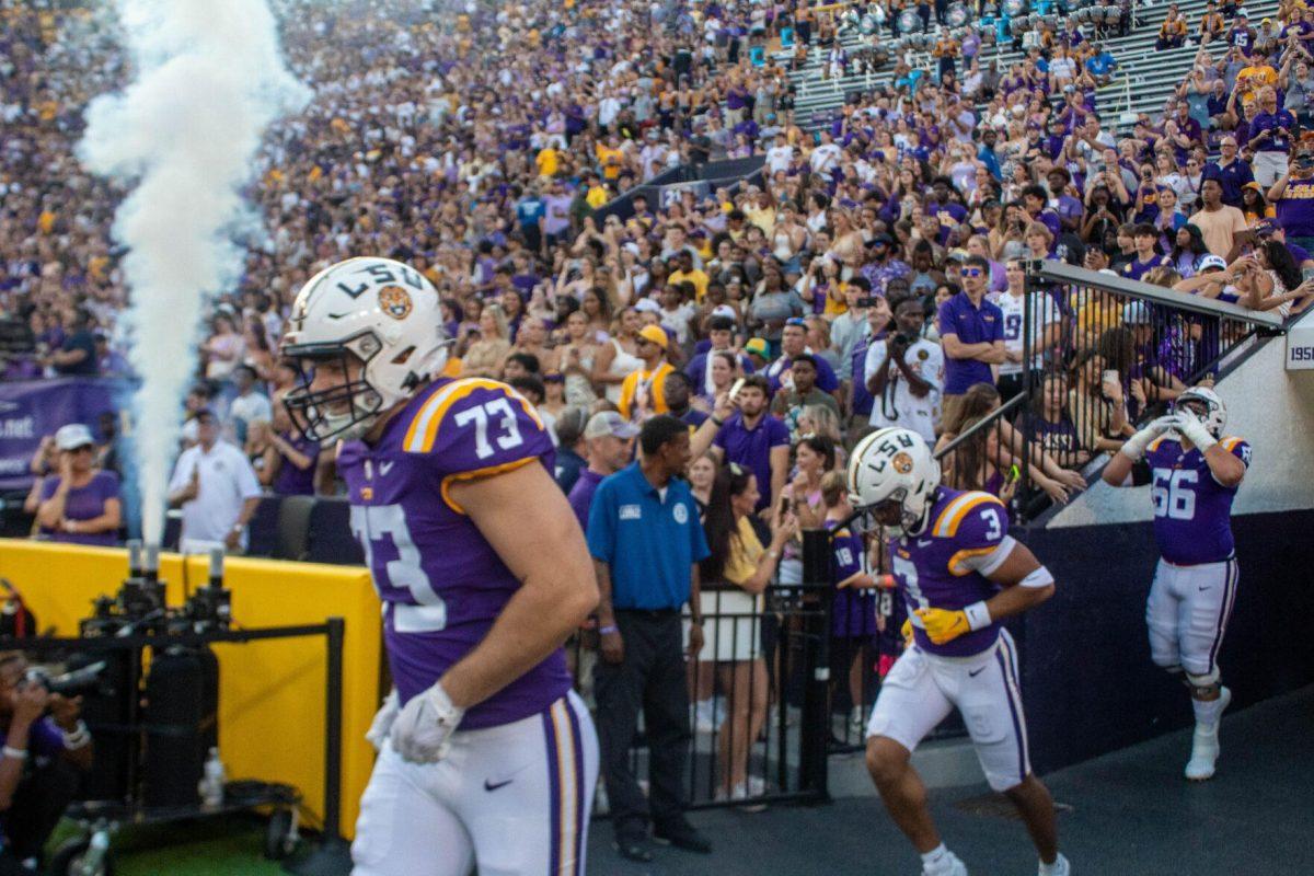 Fans watch as the LSU football team runs out onto the field on Saturday, Sept. 24, 2022, right before the LSU vs New Mexico game in Tiger Stadium.