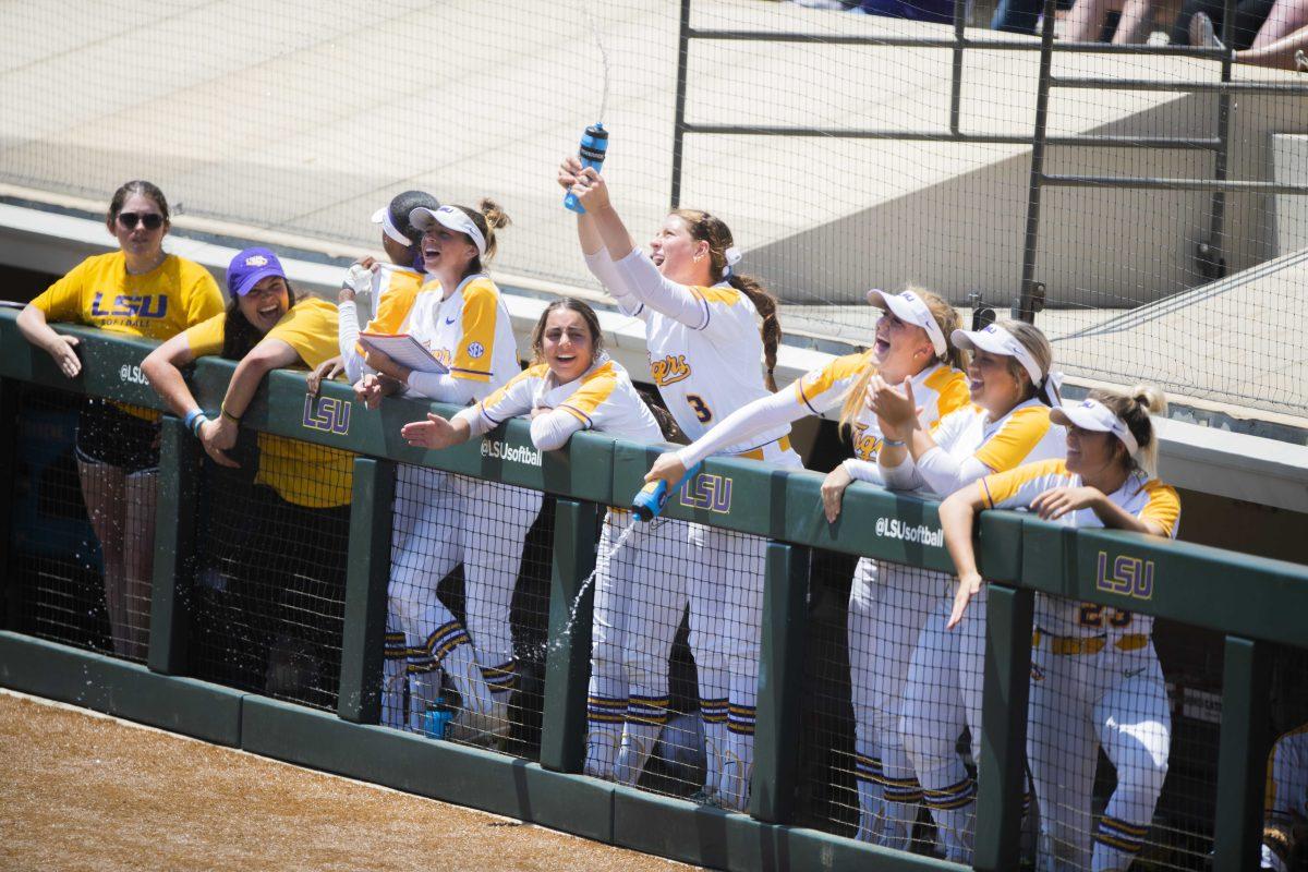 LSU softball dugout goes crazy after a play went in their favor Sunday, May 1, 2022, during the Tigers' 2-1 loss against Florida at Tiger Park in Baton Rouge, La.