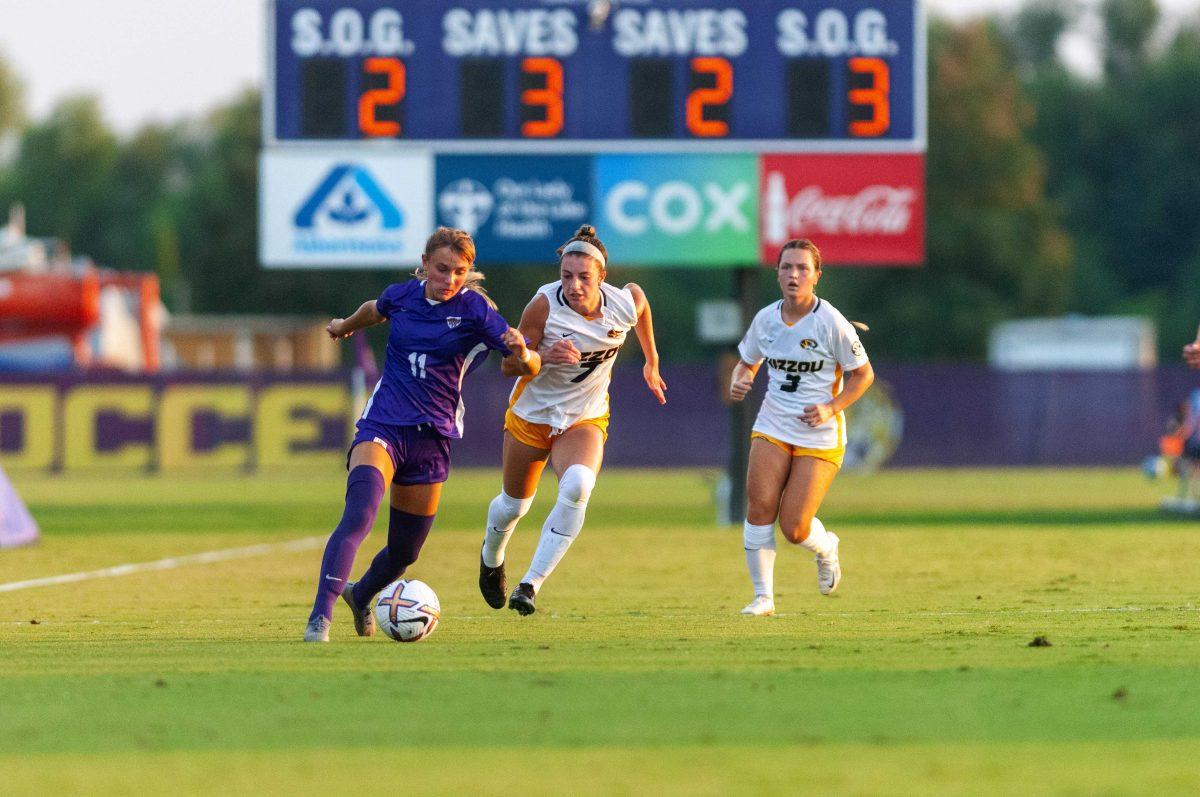 LSU soccer freshman forward Angelina Thoreson (11) fights on Missouri defenders Thursday, Sept. 22, 2022, during LSU's 2-1 win against University of Missouri at LSU's Soccer Stadium off Nicholson Drive.