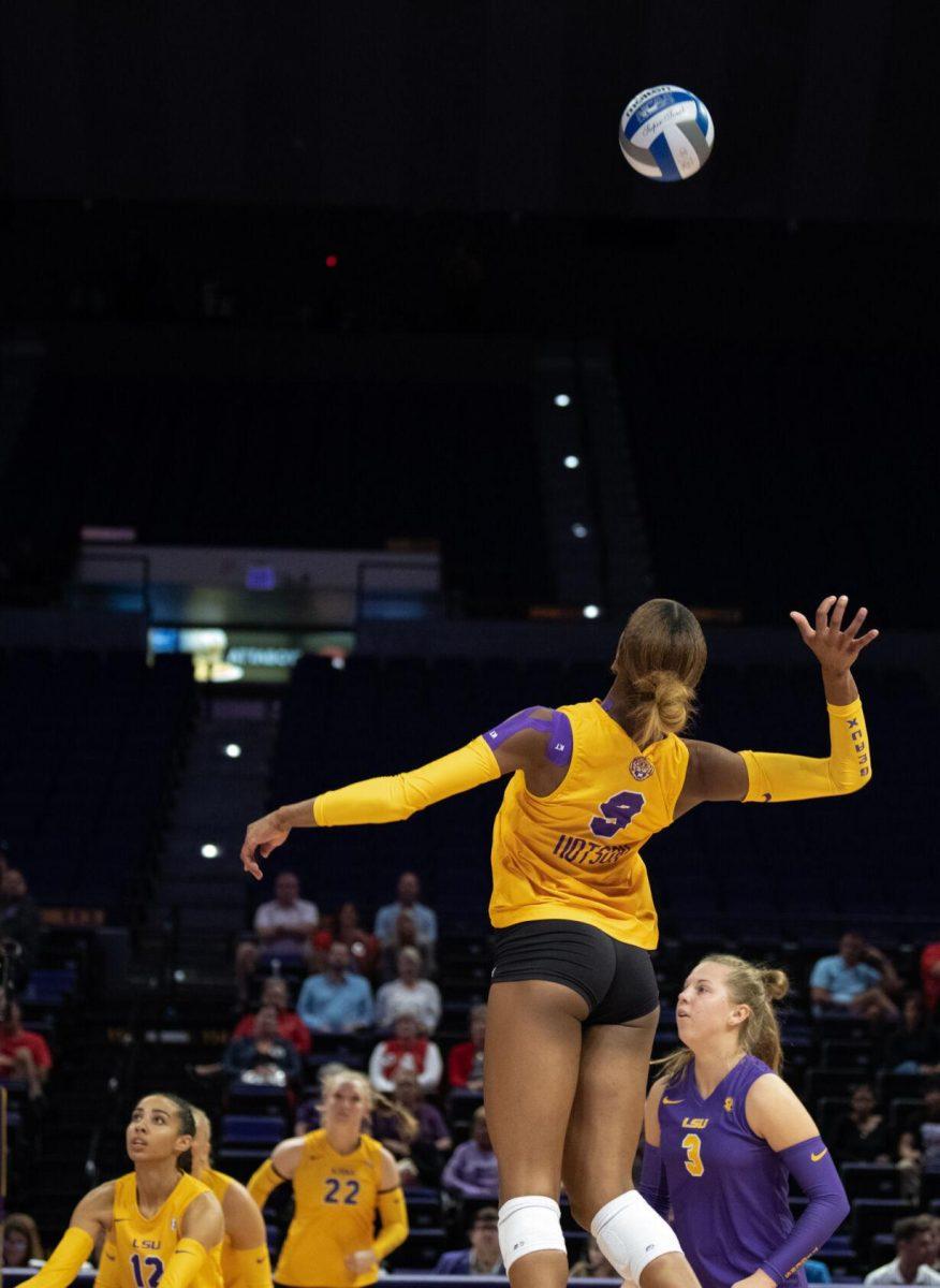 LSU volleyball senior outside hitter Sanaa Dotson (9) jumps up to hit the ball on Saturday, Oct. 1, 2022, during LSU&#8217;s 2-3 defeat to Ole Miss at the Pete Maravich Assembly Center in Baton Rouge, La.