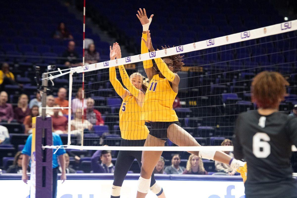 LSU volleyball Josie Vondran (5) and Anita Anwusi (11) attempt to block the ball on Sunday, Oct. 30, 2022, during LSU&#8217;s 3-2 loss to Mississippi State at the Pete Maravich Assembly Center in Baton Rouge, La.