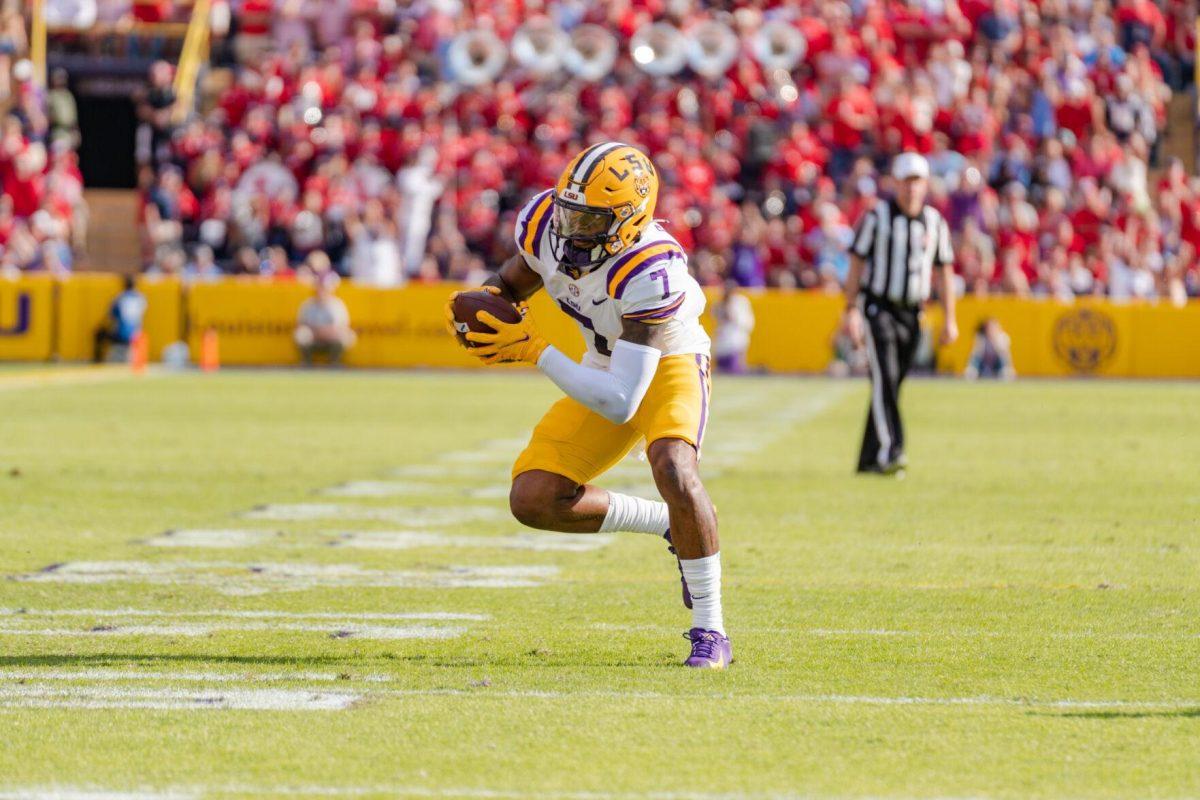 LSU football junior wide receiver Kayshon Boutte (7) looks down field on Saturday, Oct. 22, 2022, during LSU&#8217;s 45-20 victory over Ole Miss in Tiger Stadium in Baton Rouge, La.