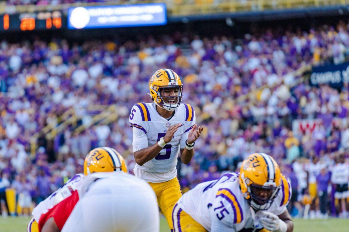 LSU football junior quarterback Jayden Daniels (5) calls the snap on Saturday, Oct. 22, 2022, during LSU&#8217;s 45-20 victory over Ole Miss in Tiger Stadium in Baton Rouge, La.