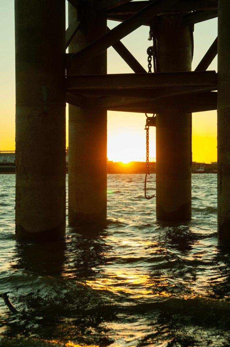 Waves from the Mississippi River glow in the sinking sun on Thursday, Oct. 20, 2022, near River Road in Baton Rouge, La.