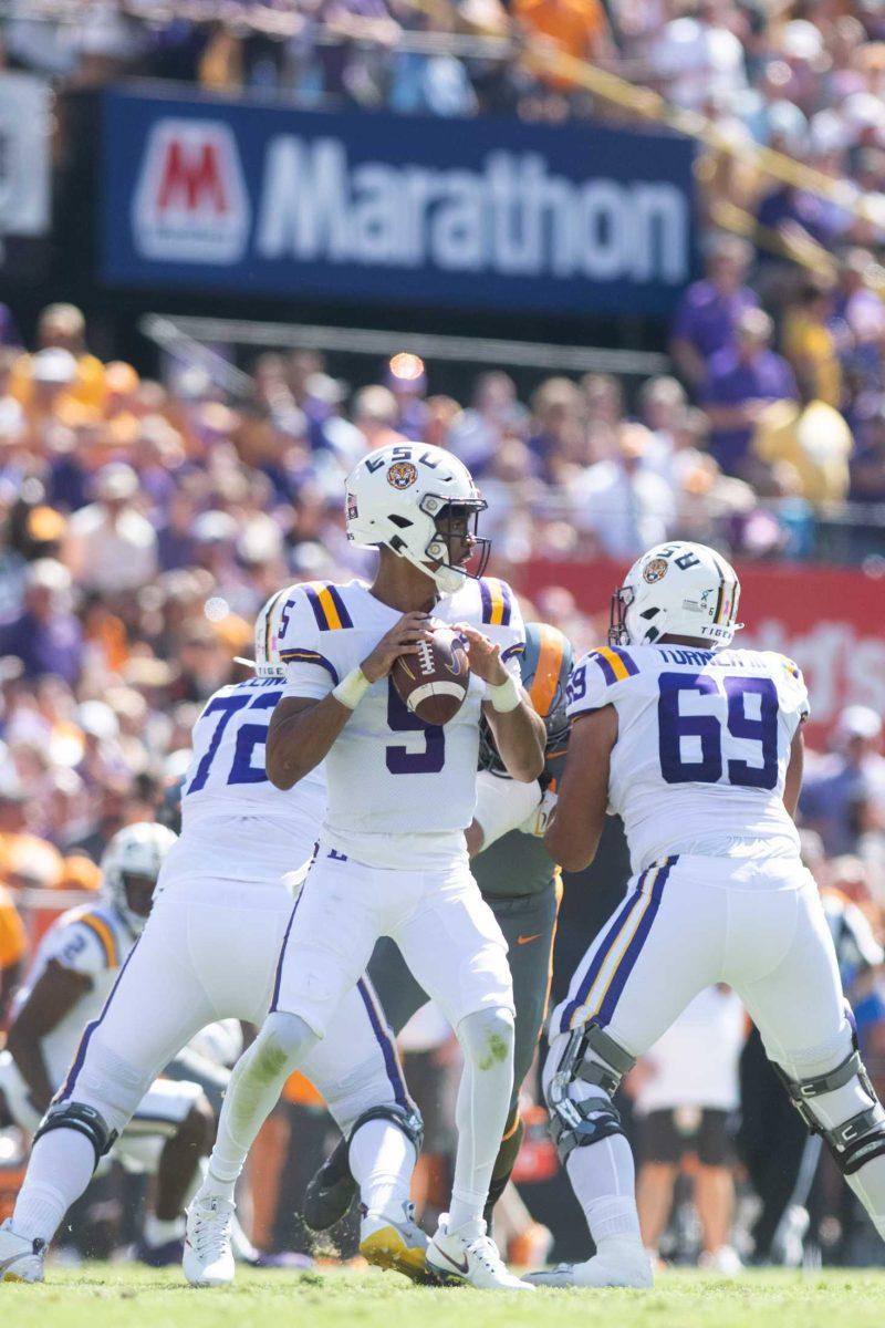 <p>LSU junior quarterback Jayden Daniels (5) looks to make a pass on Saturday, Oct. 8, 2022, during LSU's defeat to Tennessee 13-40 in Tiger Stadium.</p>