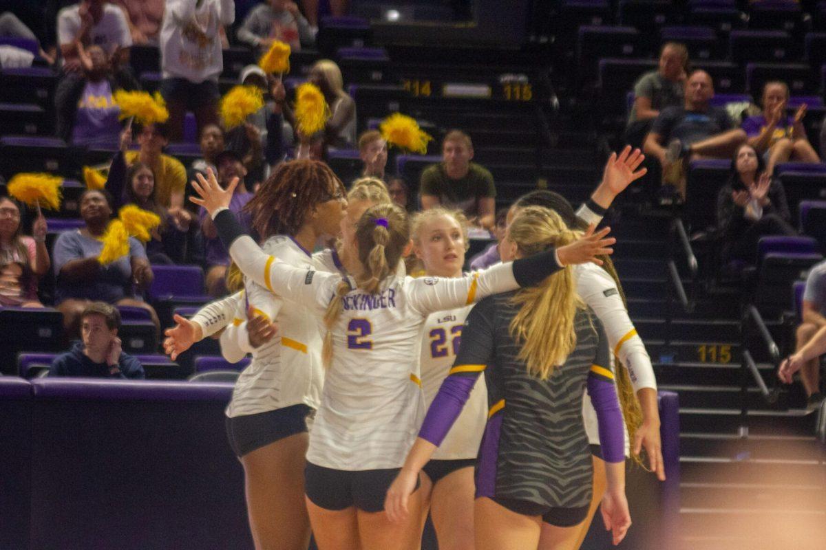 The LSU volleyball players come together to celebrate a point on Friday, Sept. 30, 2022, during their 3-2 victory against Ole Miss at the Pete Maravich Assembly Center in Baton Rouge, La.