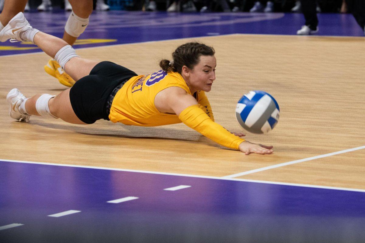 LSU volleyball senior defensive specialist Jill Bohnet (10) dives for the ball on Saturday, Oct. 1, 2022, during LSU&#8217;s 2-3 defeat to Ole Miss at the Pete Maravich Assembly Center in Baton Rouge, La.