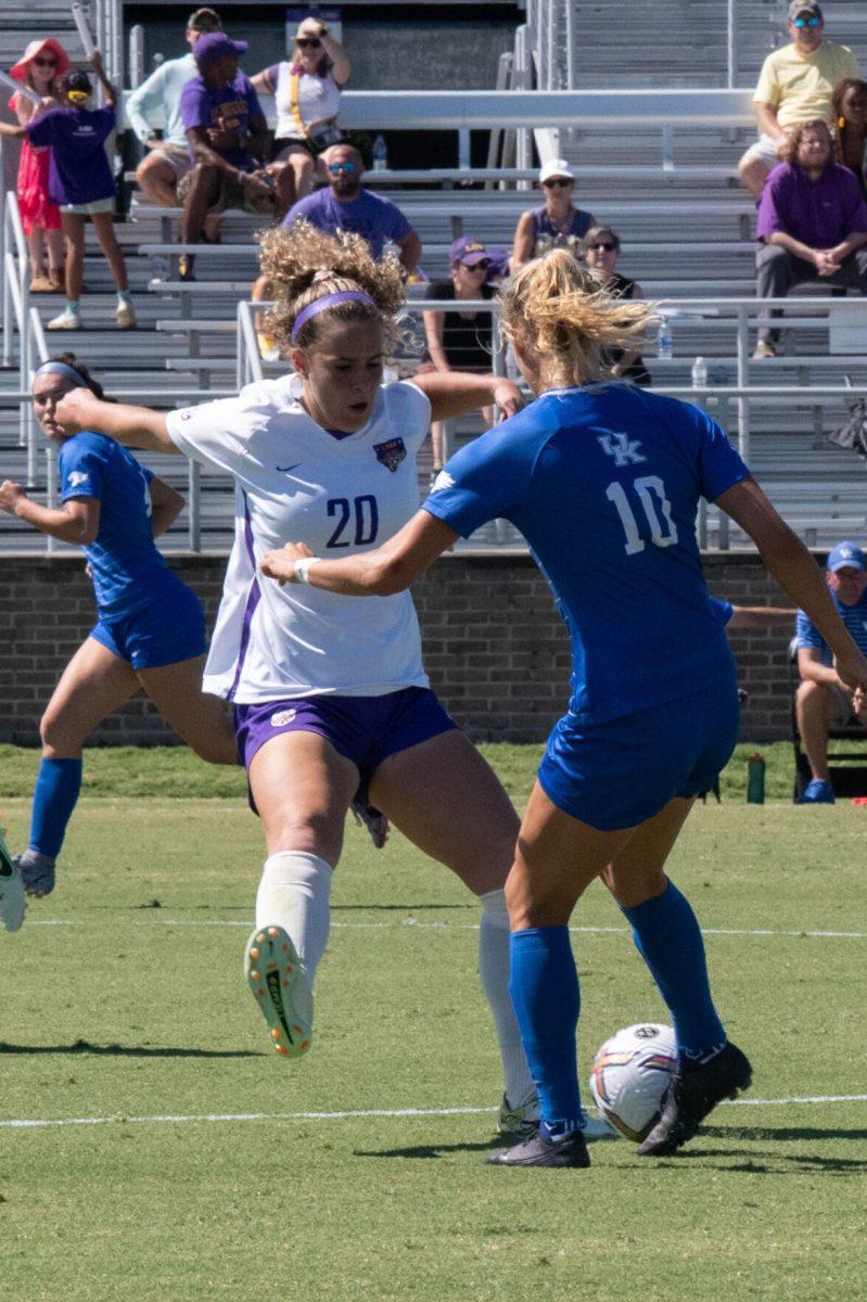 LSU soccer fifth-year senior midfielder Brenna McPartlan (20) fights for possession on Sunday, Oct. 2, 2022, during LSU&#8217;s 3-2 win against University of Kentucky at LSU&#8217;s Soccer Stadium off Nicholson Drive.