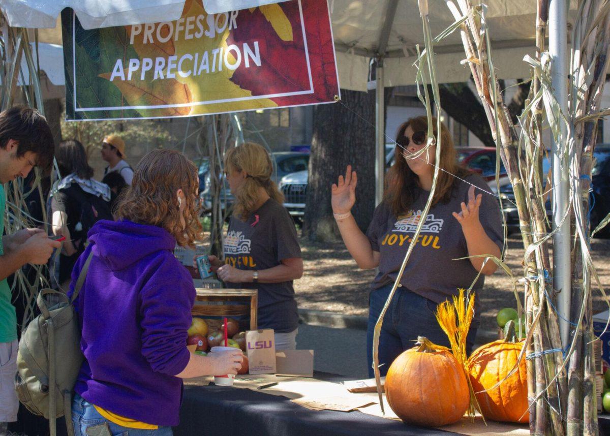 An LSU student talks at the &#8220;Professor Appreciation&#8221; booth on Wednesday, Oct. 5, 2022, on Tower Drive in Baton Rouge, La.