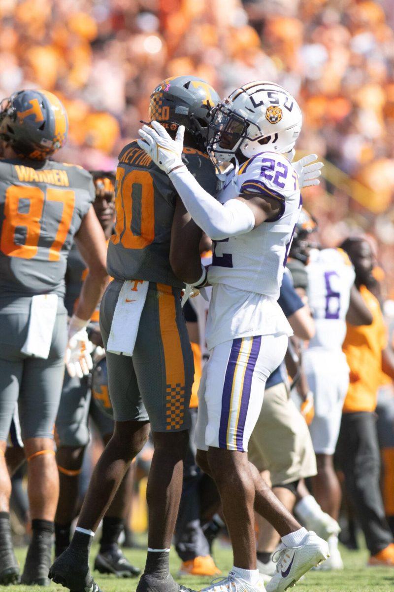 LSU cornerback Colby Richardson (22) offers congratulations to Tennessee wide receiver Ramel Keyton (80) following LSU&#8217;s defeat to Tennessee 13-40 on Saturday, Oct. 8, 2022, in Tiger Stadium.