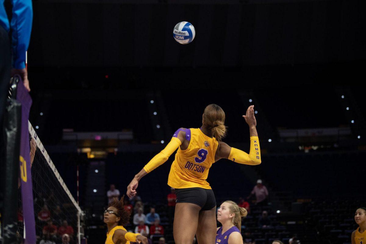 LSU volleyball senior outside hitter Sanaa Dotson (9) jumps up to hit the ball on Saturday, Oct. 1, 2022, during LSU&#8217;s 2-3 defeat to Ole Miss at the Pete Maravich Assembly Center in Baton Rouge, La.