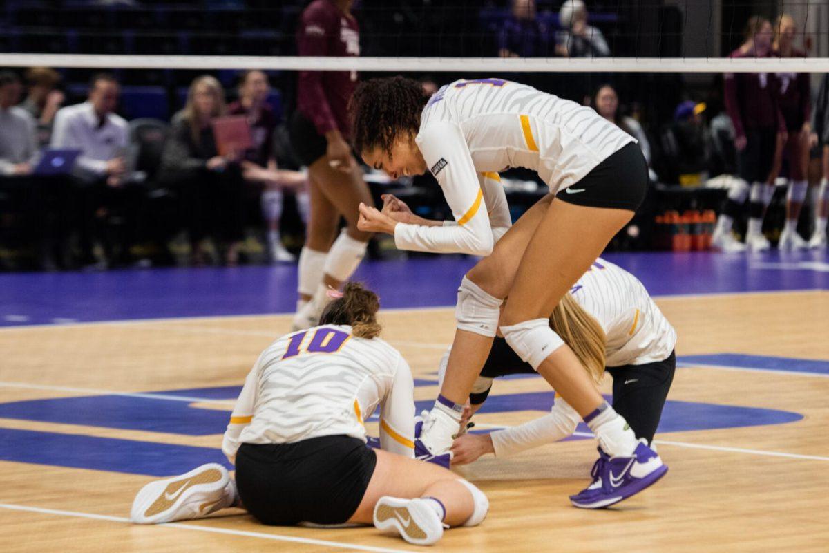 LSU volleyball junior middle blocker Alia Williams (12) celebrates a point on Saturday, Oct. 29, 2022, during LSU&#8217;s 3-2 victory against Mississippi State at the Pete Maravich Assembly Center in Baton Rouge, La.