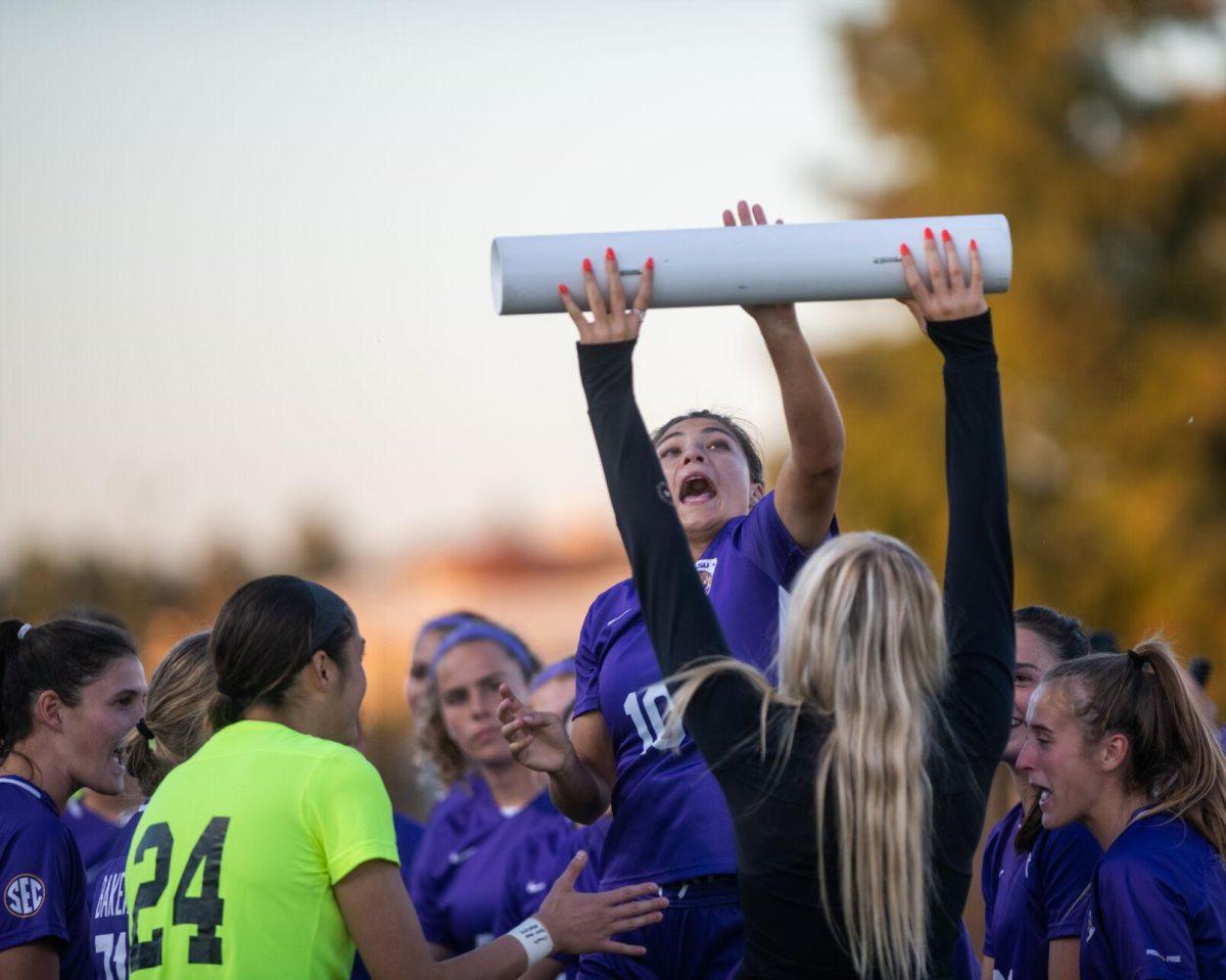 LSU soccer fifth-year senior forward Alesia Garcia (10) jumps up to tap the win bar on senior night on Thursday, Oct. 27, 2022, before the start of LSU&#8217;s 4-1 victory against Ole Miss at LSU&#8217;s Soccer Stadium off of Nicholson Drive.