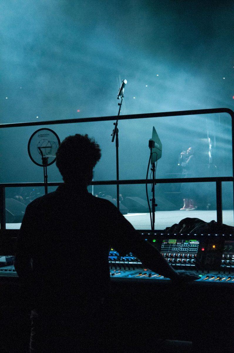 LSU electrical engineering major Arnold Christiansen monitors sound equipment during American rapper Rico Nasty's performance on Wednesday, Oct. 19, 2022, at LSU's homecoming concert at the PMAC on North Stadium Drive in Baton Rouge, La.