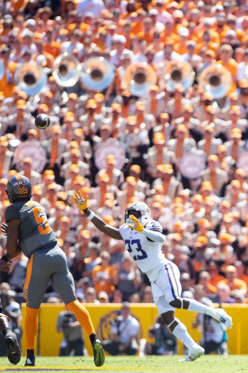 LSU senior linebacker Micah Baskerville (23) attempts to block a pass thrown by Tennessee quarterback Hendon Hooker (5) on Saturday, Oct. 8, 2022, during LSU's defeat to Tennessee 13-40 in Tiger Stadium.