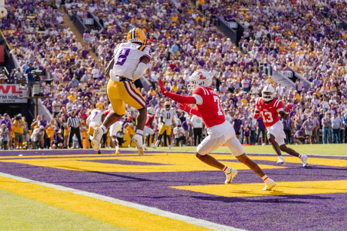 LSU football sophomore wide receiver Malik Nabers (8) leaps for the ball on Saturday, Oct. 22, 2022, during LSU&#8217;s 45-20 victory over Ole Miss in Tiger Stadium in Baton Rouge, La.