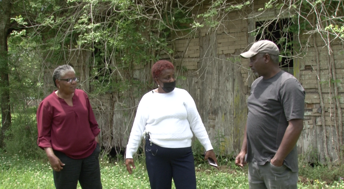 Josephine Smith Jones, center, and her siblings Nelson and Erma Smith visit the abandoned sharecropper&#8217;s house in New Roads, Louisiana, where they and their brother Denver Smith grew up.&#160;