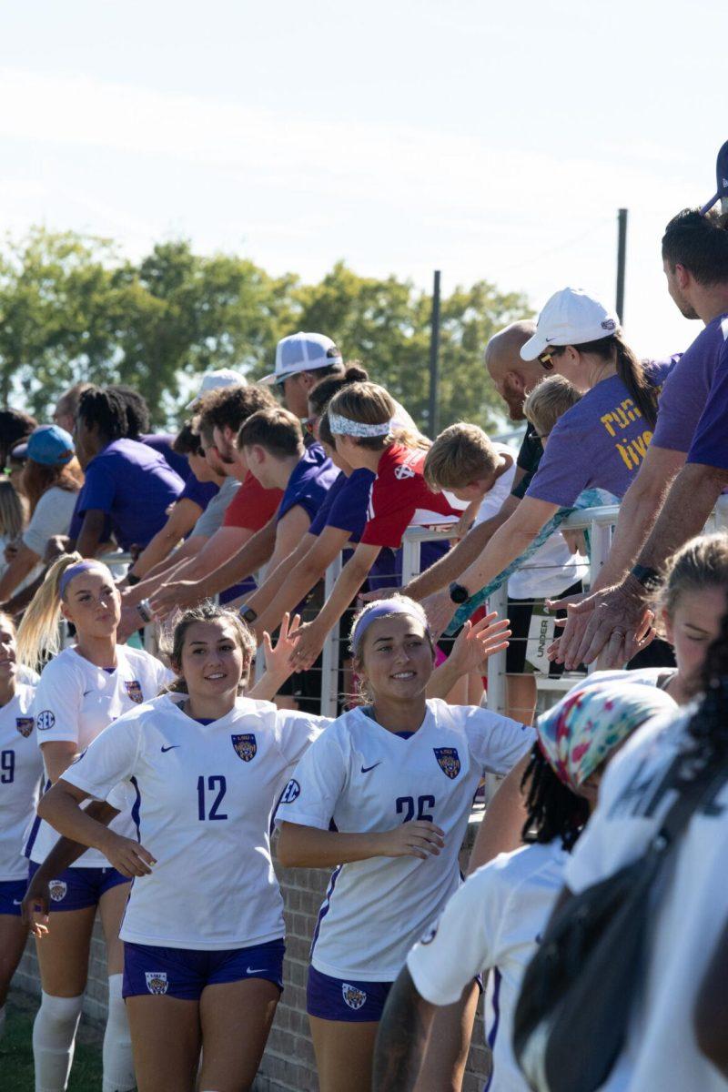 The LSU soccer team gives out high fives to fans on Sunday, Oct. 2, 2022, after LSU&#8217;s 3-2 win against University of Kentucky at LSU&#8217;s Soccer Stadium off Nicholson Drive.