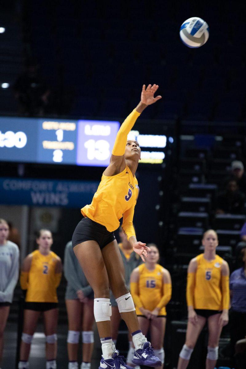 LSU volleyball senior outside hitter Sanaa Dotson (9) serves the ball on Saturday, Oct. 1, 2022, during LSU&#8217;s 2-3 defeat to Ole Miss at the Pete Maravich Assembly Center in Baton Rouge, La.