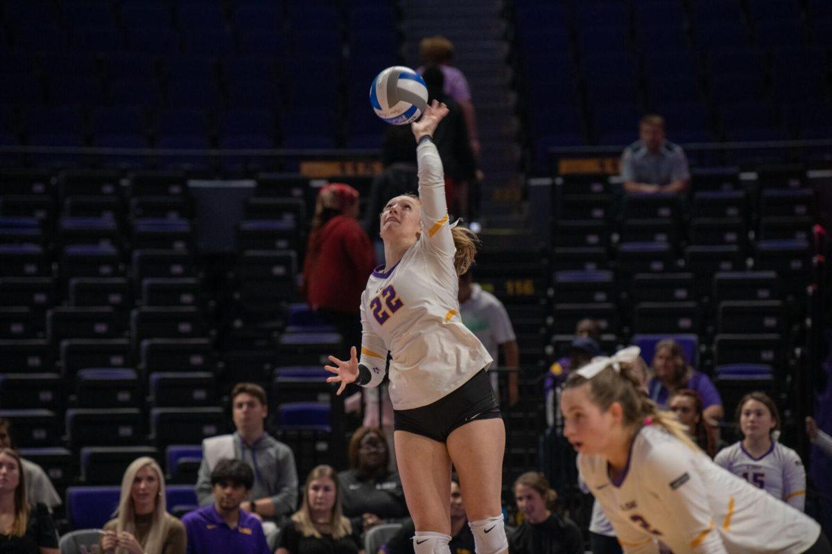 LSU volleyball freshman setter Maddie Waak (22) serves the ball on Wednesday, Oct. 5, 2022, before their 3-2 victory over Auburn in the Pete Maravich Assembly Center on N. Stadium Drive.