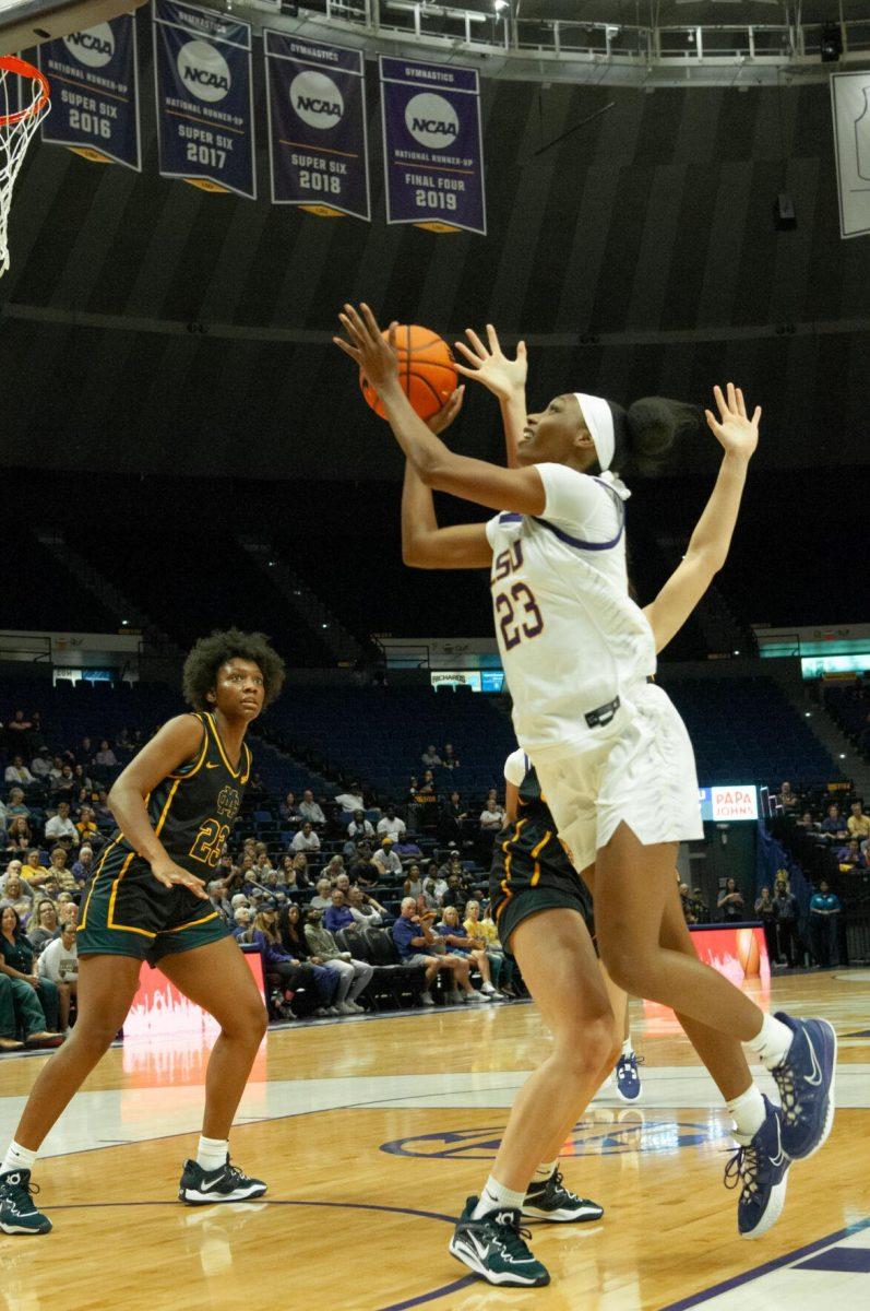 LSU women's basketball forward Amani Bartlett leaps toward the goal for a shot at an exhibition game against Mississippi College on Thursday, Oct. 27, 2022, in the Pete Maravich Assembly Center on N. Stadium Drive.