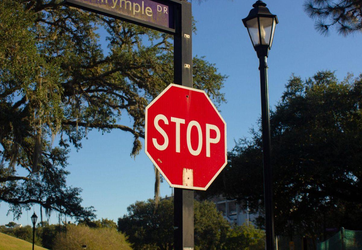 A red stop sign hangs on Monday, Sept. 26, 2022, on Dalrymple Drive in Baton Rouge, La.