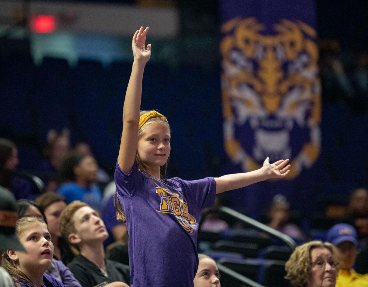 A young LSU fan stands proud on Saturday, Oct. 1, 2022, during LSU&#8217;s 2-3 defeat to Ole Miss at the Pete Maravich Assembly Center in Baton Rouge, La.