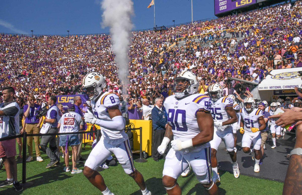 LSU football team runs onto the field on Saturday, Oct. 8, 2022, before Tennessee&#8217;s 40-13 victory over LSU in Tiger Stadium.