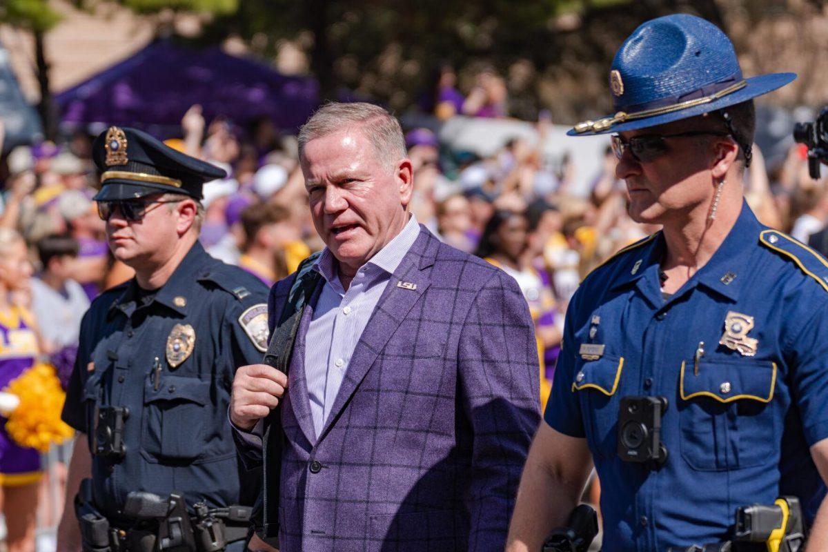 LSU football head coach Brian Kelly walks down Victory Hill on Saturday, Oct. 22, 2022, prior to LSU&#8217;s 45-20 victory over Ole Miss in Tiger Stadium in Baton Rouge, La.