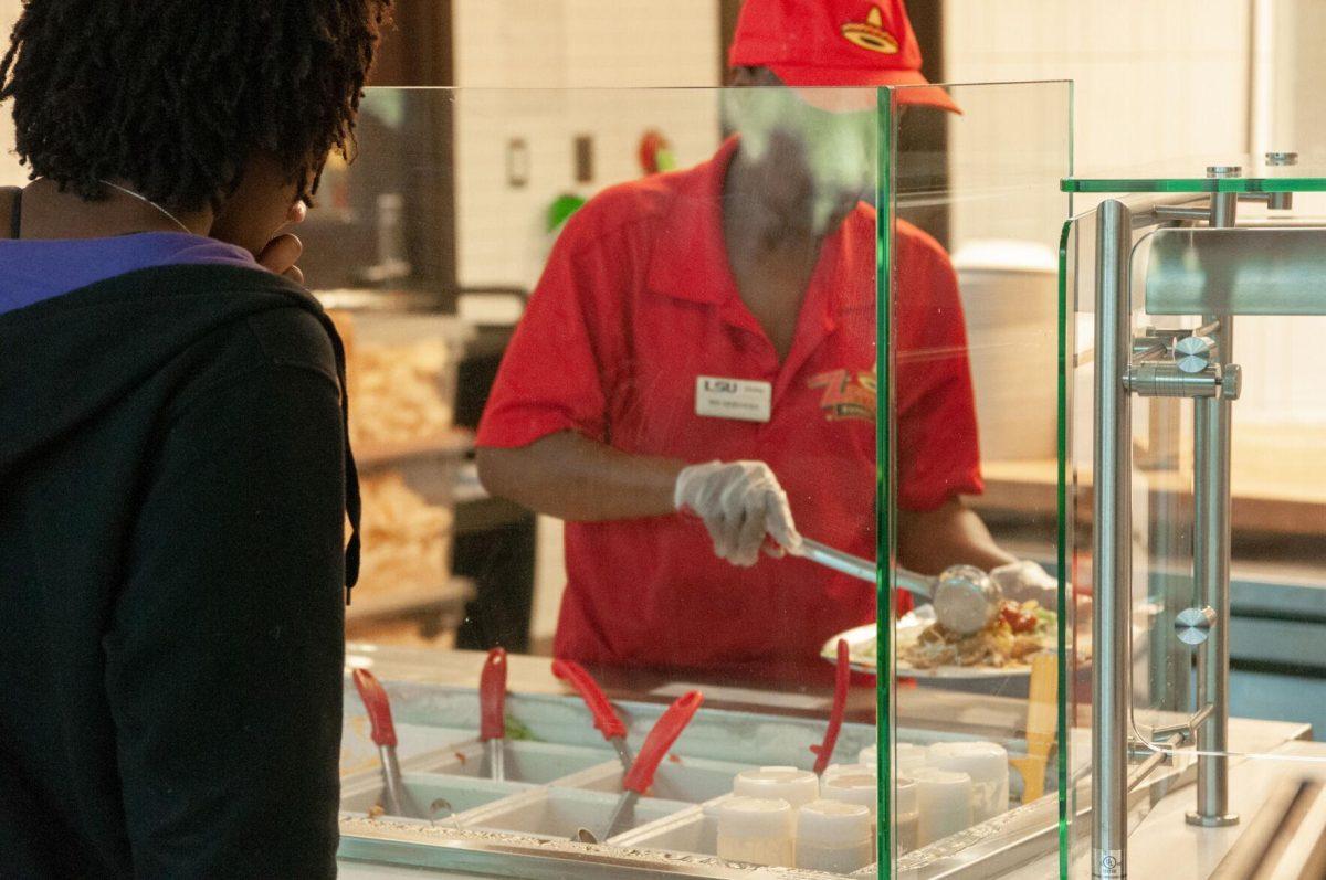 A student orders a burrito at Zippy&#8217;s on Thursday, Oct. 6, 2022, in the LSU Student Union on Highland Road in Baton Rouge, La.