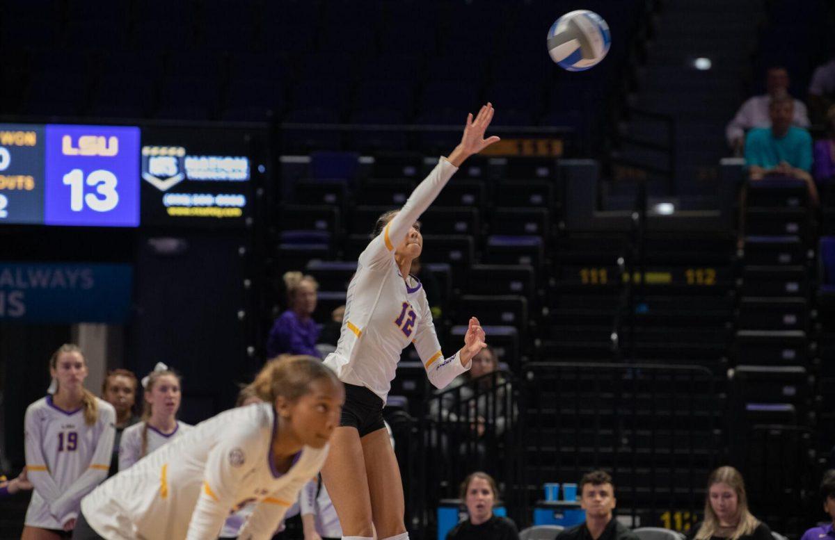 LSU volleyball junior middle blocker Alia Williams (12) serves the ball on Wednesday, Oct. 5, 2022, before their 3-2 victory over Auburn in the Pete Maravich Assembly Center on N. Stadium Drive.