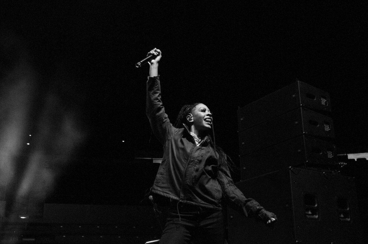 American rapper Rico Nasty holds her microphone to the sky on Wednesday, Oct. 19, 2022, at LSU's homecoming concert at the PMAC on North Stadium Drive in Baton Rouge, La.